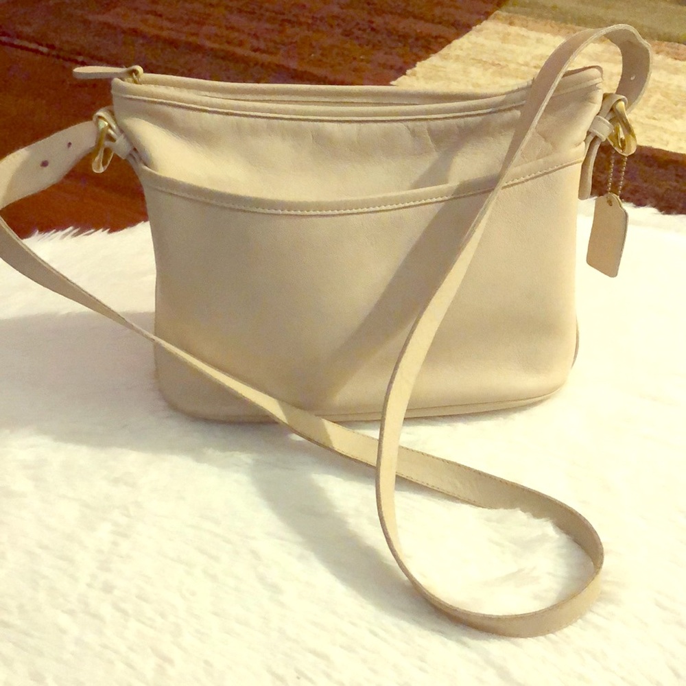 Gorgeous vintage cream leather coach bag.